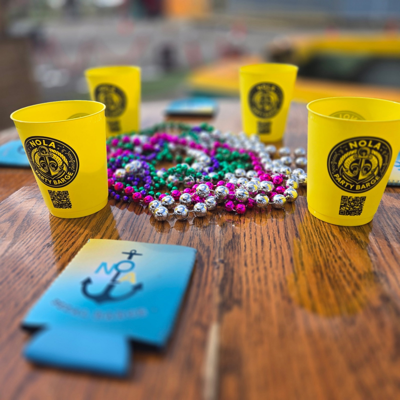 Drinks and Mardi Gras beads on a BYOB party boat in New Orleans