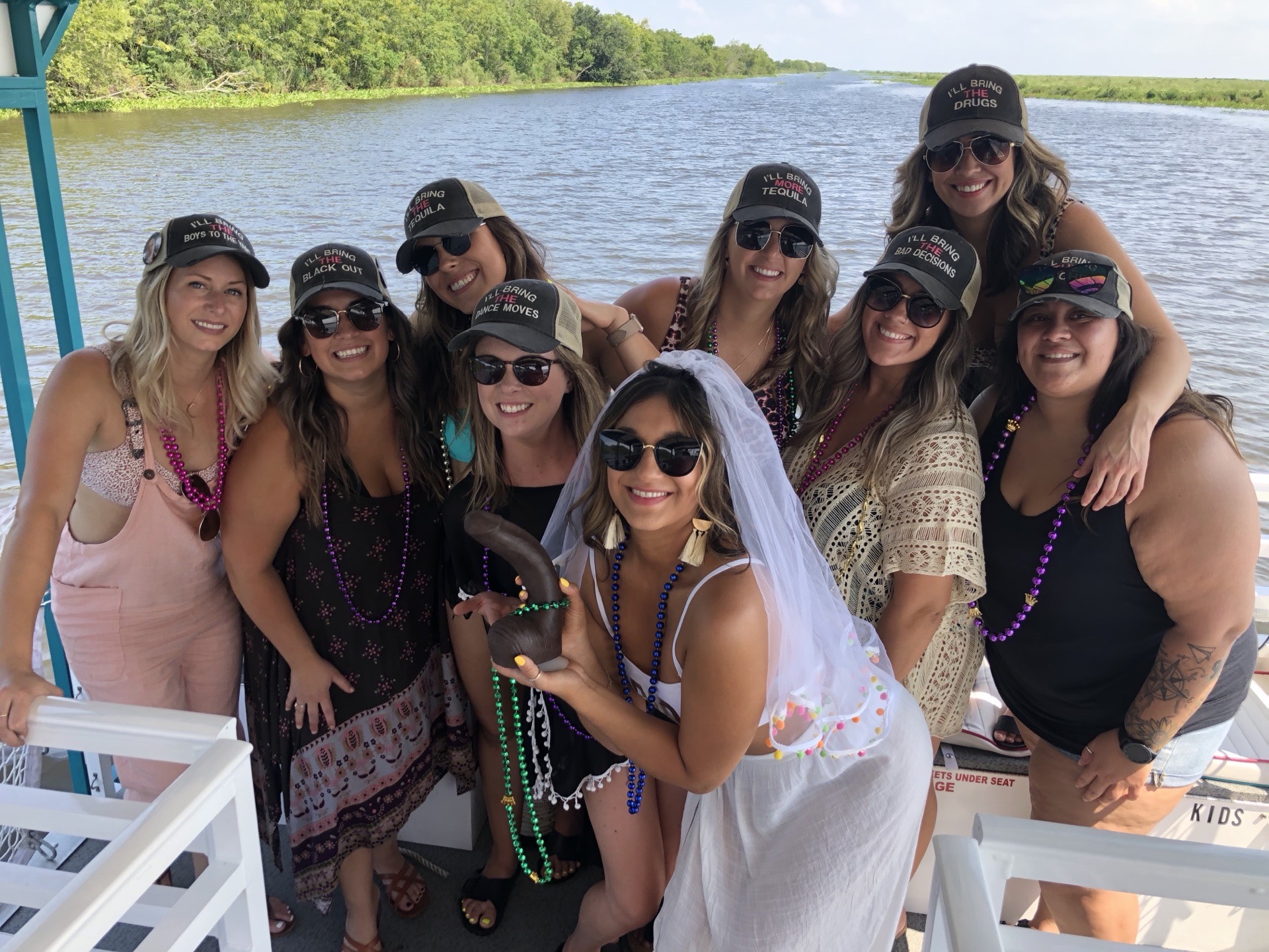 Bachelorette group celebrating with the bride on a New Orleans party boat